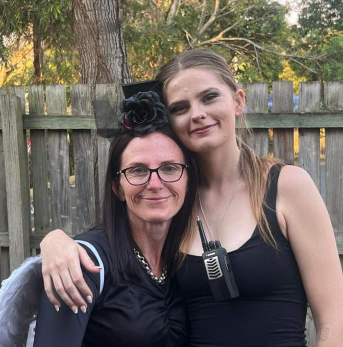 Two women smiling together outdoors, related to human remains found in search for missing teenager Pheobe Bishop. Two women smiling together outdoors, related to human remains found in search for missing teenager Pheobe Bishop.