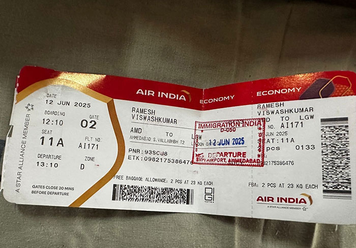Air India boarding pass showing economy class ticket for passenger Ramesh Vishwashkumar on flight A1171.