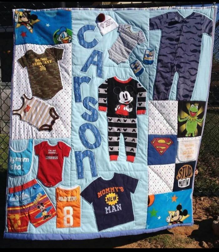 Patchwork baby clothes quilt with mismatched designs and uneven lettering, showcasing horrible crafts criticized by netizens.
