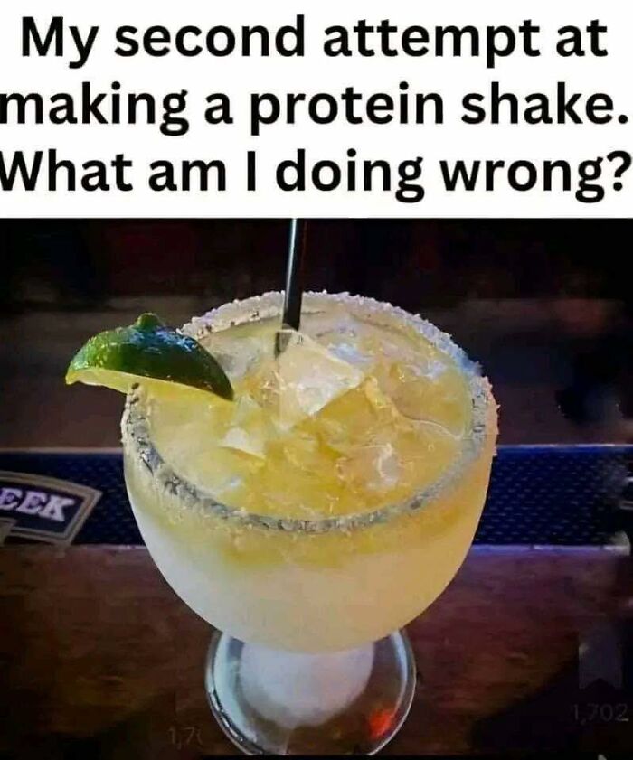 Humorous post showing a margarita with lime and salt, joking about making a protein shake wrong.