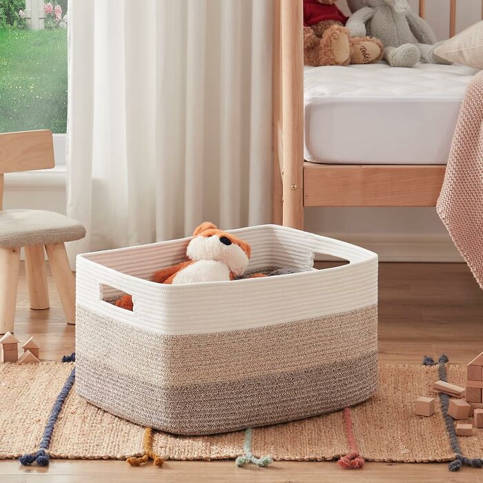 Soft storage basket with stuffed toy in a cozy bedroom, showcasing Prime Day home deals for stylish organization.