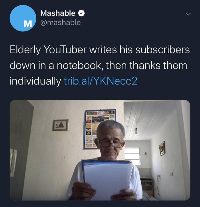 Elderly YouTuber writing subscriber names in a notebook showing wholesome feel-good moments to restore faith in humanity