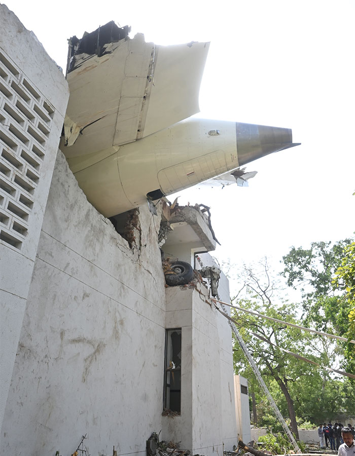 Plane crash causing severe building damage with people investigating the unusual take-off and suspected evil intent.