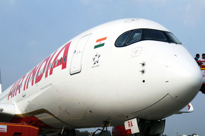 Close-up of Air India Boeing jet nose highlighting tech failures exposed by passenger hours before crash, sparking outrage.