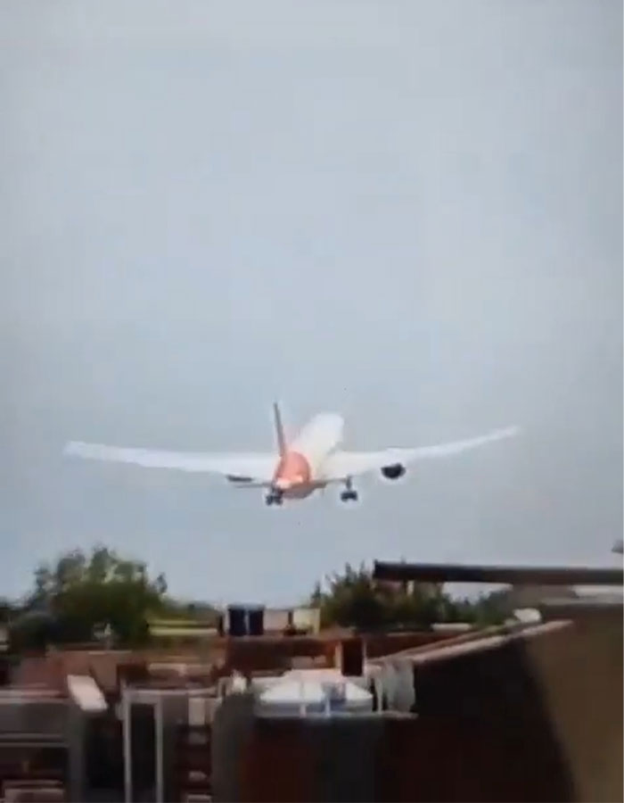 Air India plane in early flight with mysterious object flying off, sparking wild theories about doomed aircraft incident.