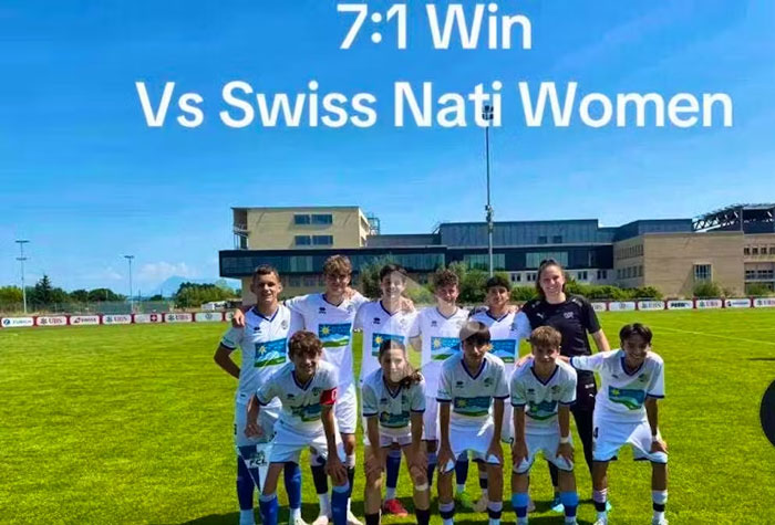 U15 boys soccer team posing on field after a 7-1 win over female national soccer team, sparking reactions U15 boys soccer team posing on field after a 7-1 win over female national soccer team, sparking reactions