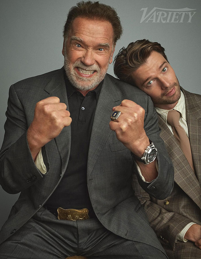Arnold Schwarzenegger and his look-alike love child posing together in suits for a Variety portrait session. Arnold Schwarzenegger and his look-alike love child posing together in suits for a Variety portrait session.