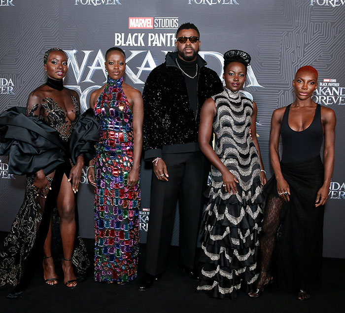 Cast and crew of Black Panther posing on the red carpet, amid massive outrage over new Black Panther being white.