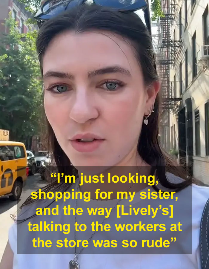 Woman speaking outdoors in a city setting describing Blake Lively's alleged rude behavior during a shopping trip.