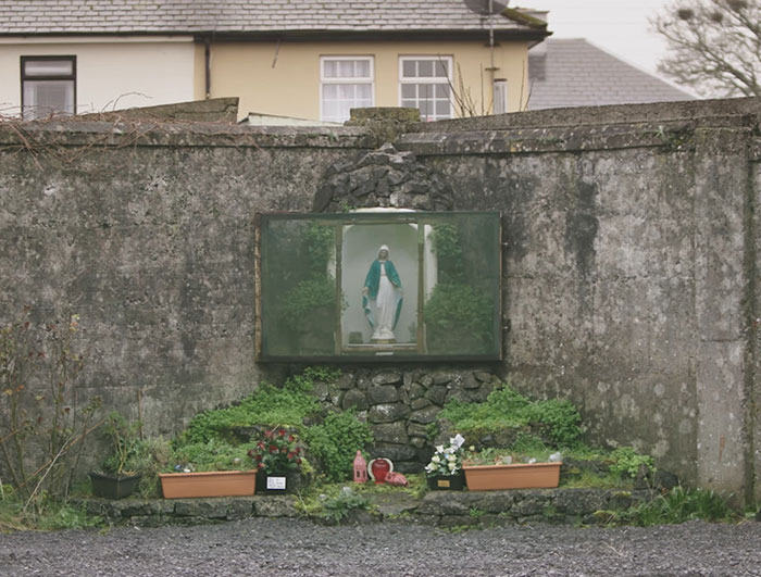 Statue of Virgin Mary behind a stone wall at a Catholic home where babies' bodies are expected to be found in septic tank. Statue of Virgin Mary behind a stone wall at a Catholic home where babies' bodies are expected to be found in septic tank.
