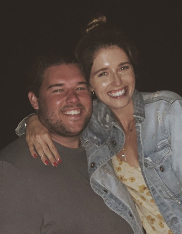 Christopher Schwarzenegger smiling with a woman, showcasing his dramatic weight loss in a casual night setting. Christopher Schwarzenegger smiling with a woman, showcasing his dramatic weight loss in a casual night setting.