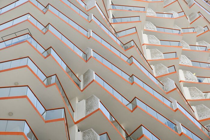 Abstract architectural pattern with zigzag balconies showcasing stunning color photography and modern design details.