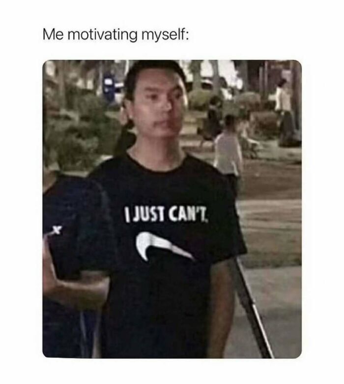 Young man outdoors wearing a black shirt that says I just can't, capturing relatable energy in a funny meme format.