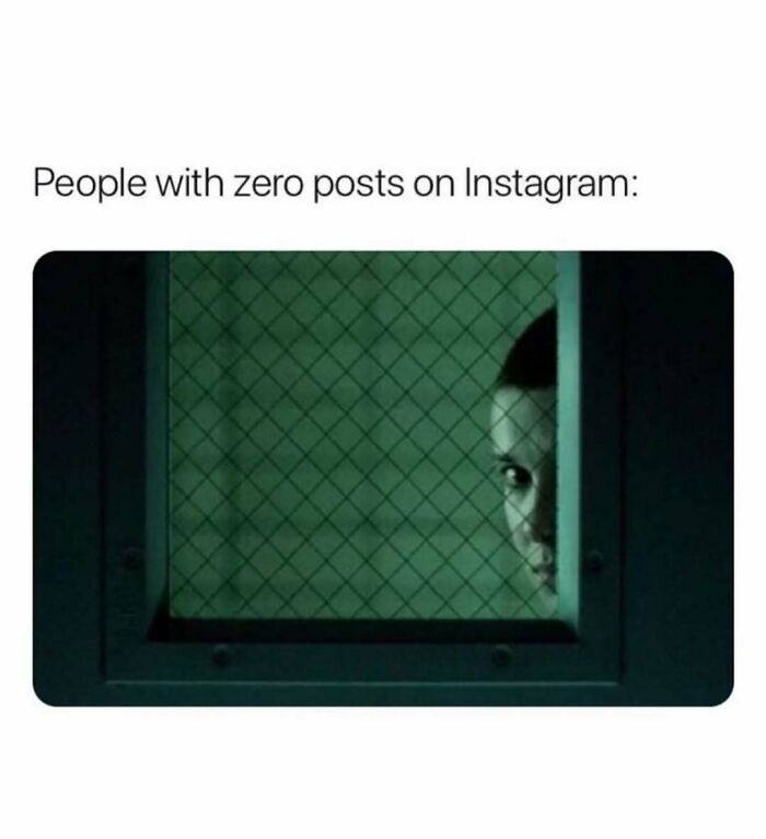 Person peeking suspiciously through a window with text about people with zero posts on Instagram, showing relatable energy.