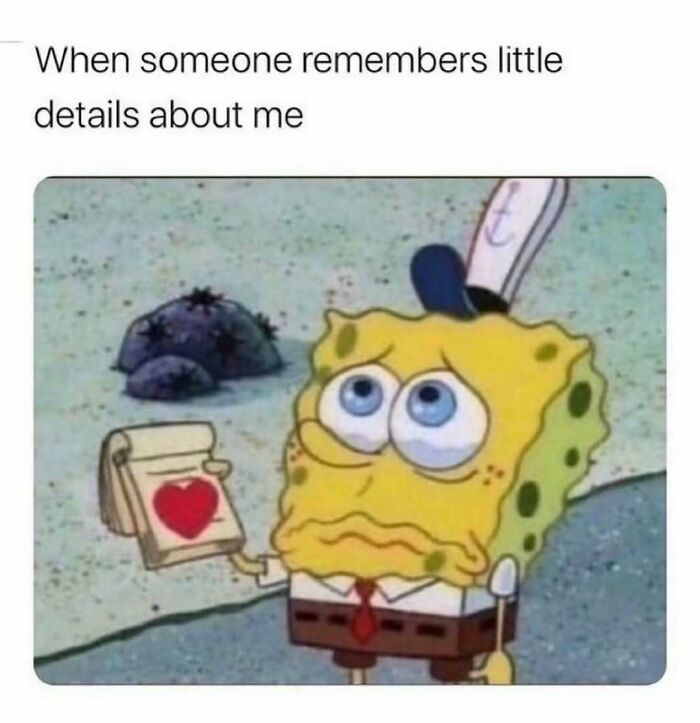 SpongeBob with big eyes holding a notepad with a heart, showing relatable energy when someone remembers details.
