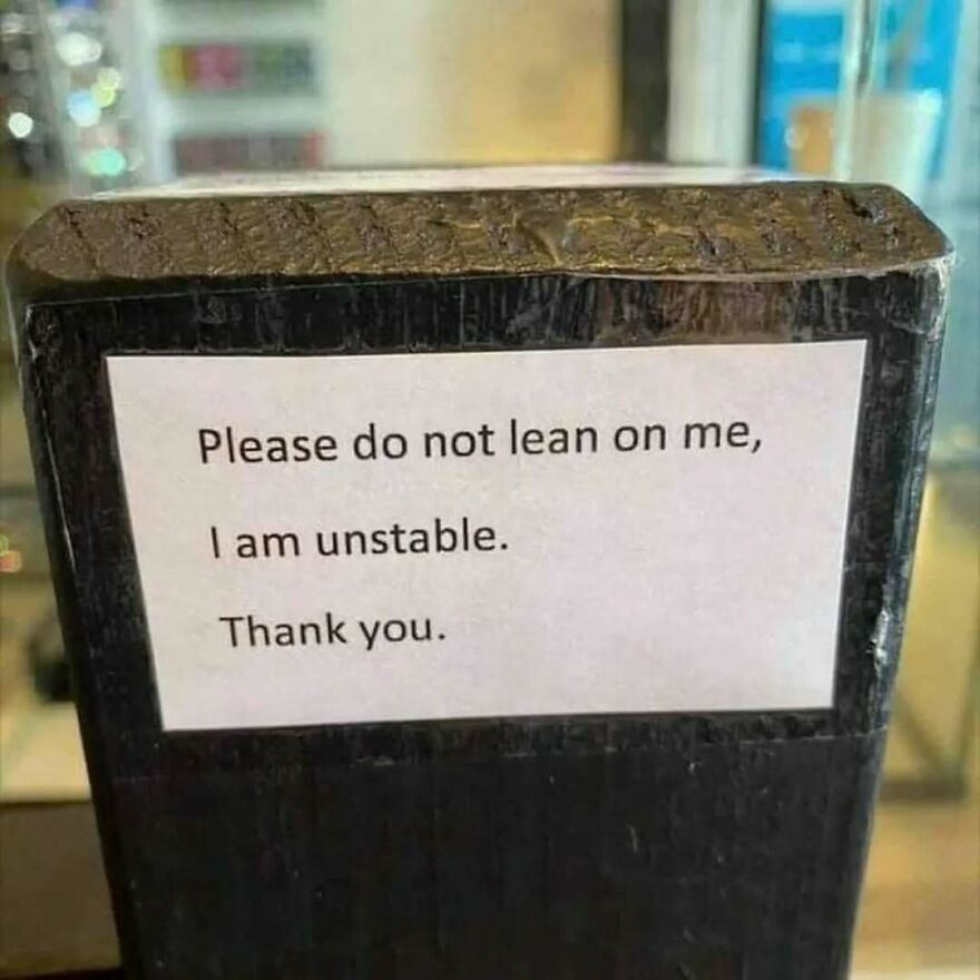 Sign on unstable object humorously warns not to lean, fitting bizarre yet hilarious pics that make you do a double take.