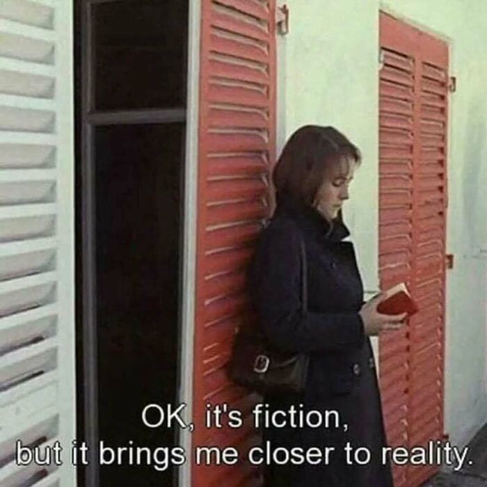 Woman reading a book near red shutters with caption about fiction bringing her closer to reality, intellectual memes concept.
