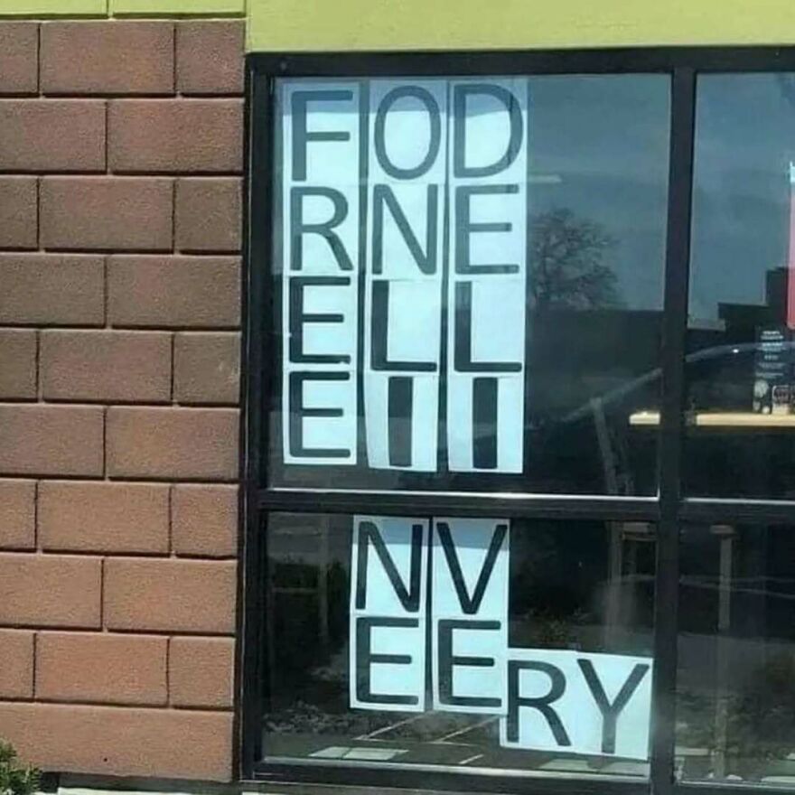 Sign on a window with letters spelling a confusing message, a bizarre yet hilarious pic that might make you do a double take.