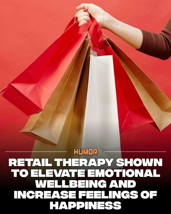Hand holding multiple colorful shopping bags representing retail therapy to boost emotional wellbeing and happiness facts.