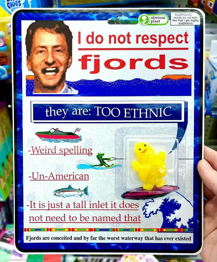 Fake product packaging mocking fjords with humorous spelling and design, part of guy sneaking fake products into real stores.