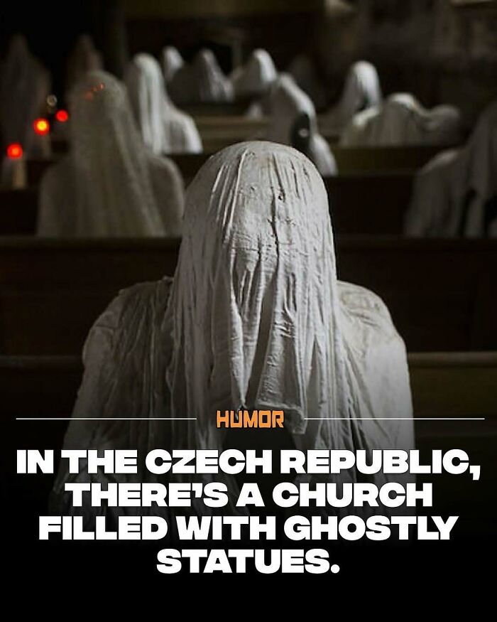 Ghostly statues covered in white cloth inside a dimly lit Czech Republic church full of intriguing facts.