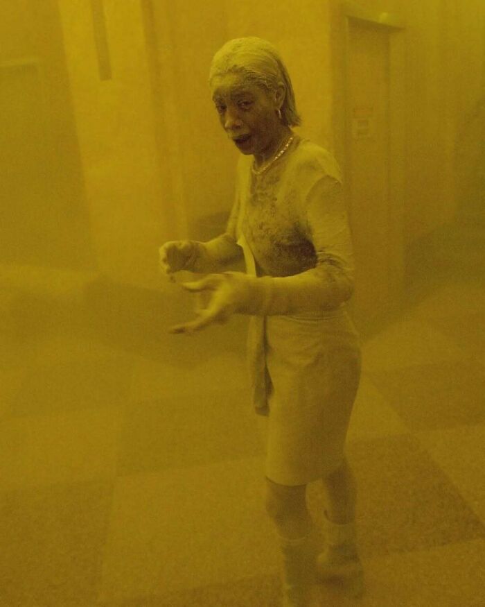 Person covered in ash inside a yellow-tinted room illustrating weird things about history from an Instagram account.