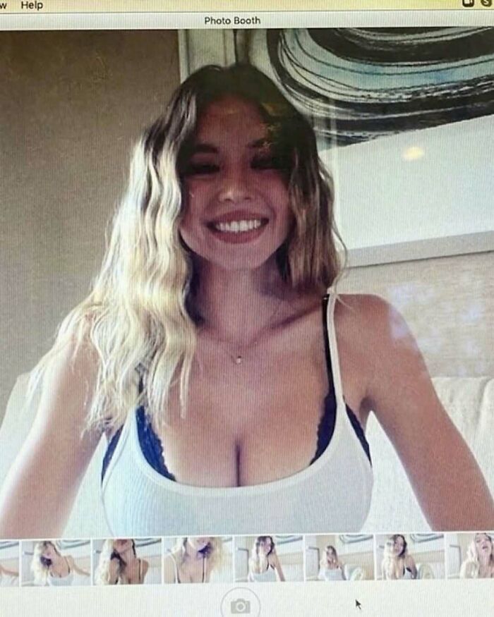 Image of a young woman smiling in a casual setting, showcasing nature, animals, and random fun facts themes.