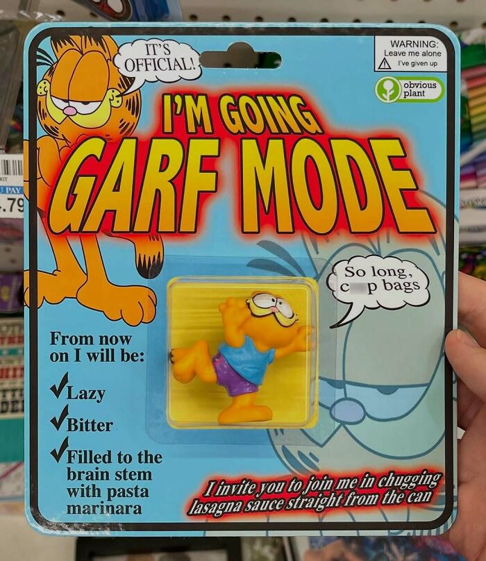Parody fake Garfield toy labeled Garf Mode, humorously designed as a fake product in a real store.
