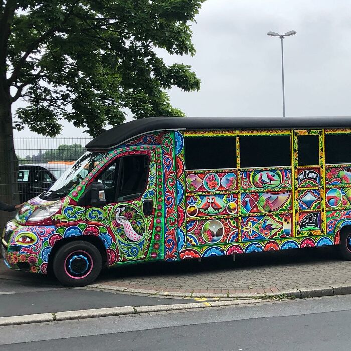 Colorful, intricate patterns painted on a van, showcasing the artist’s skill in turning cars into stunning works of art.
