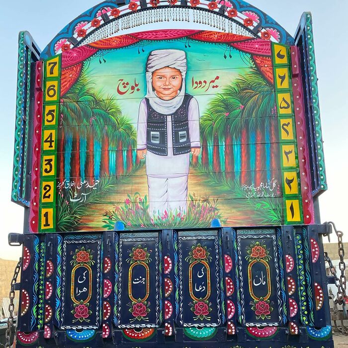 Colorful, intricate patterns painted on the back of a truck, showcasing stunning car artwork by a talented artist.