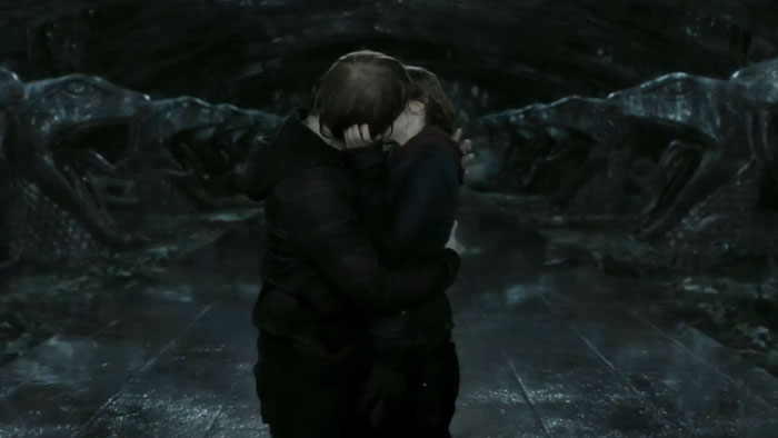 A dark scene from Harry Potter with two characters embracing, highlighting controversial incest discussion and Emma Watson&rsquo;s reaction.
