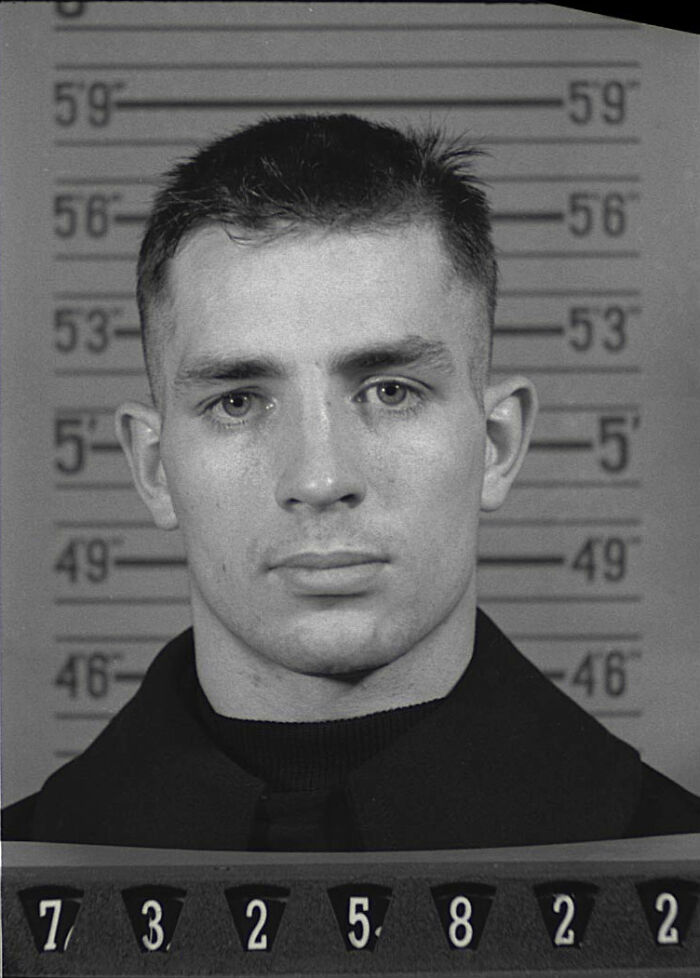 Black and white mugshot of a young man showing famous names from history known for being good looking.