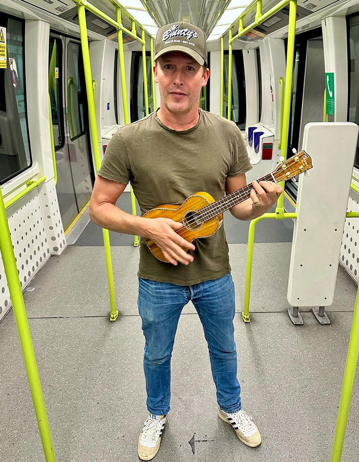James Blunt playing ukulele on a subway train, sharing the dark meaning behind hit song You’re Beautiful. James Blunt playing ukulele on a subway train, sharing the dark meaning behind hit song You’re Beautiful.