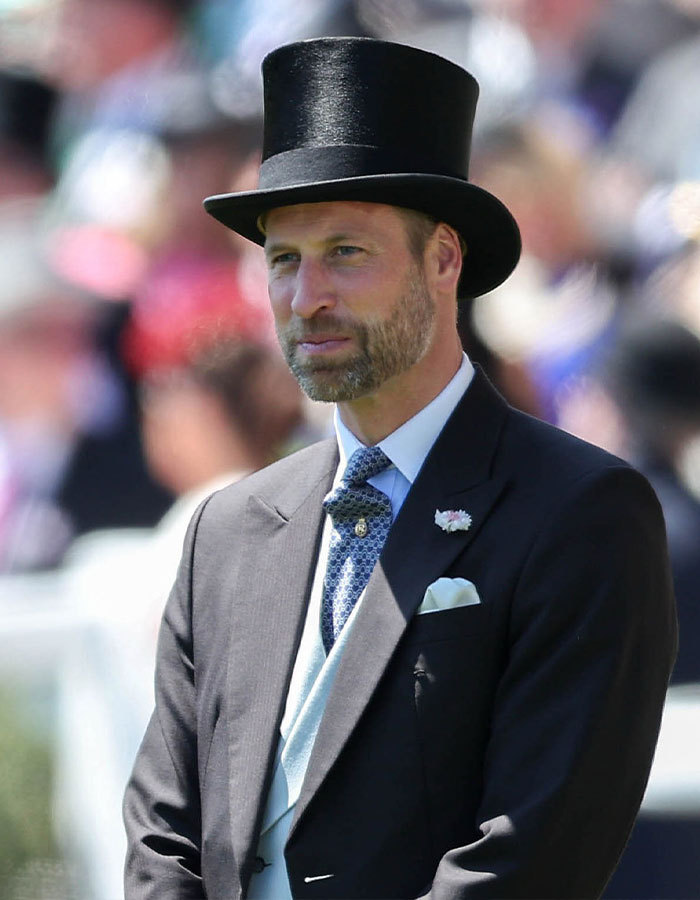 Prince William in formal attire with top hat, celebrating his 43rd birthday as Kate Middleton shares cute puppy pic.