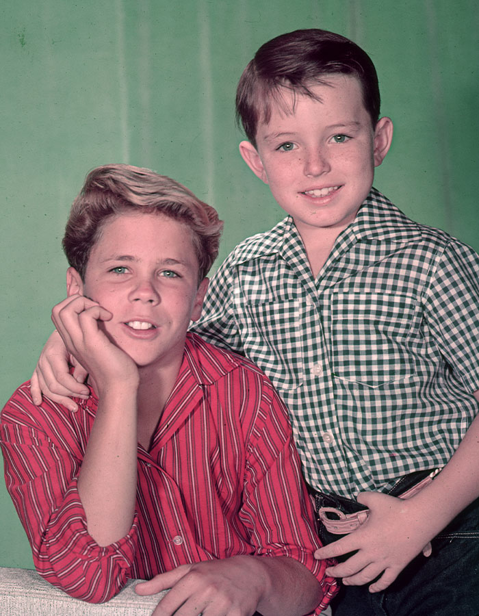 Young cast members of a beloved 50s show pose together, highlighting the nostalgia of the nearly 70 years after release reunion. Young cast members of a beloved 50s show pose together, highlighting the nostalgia of the nearly 70 years after release reunion.