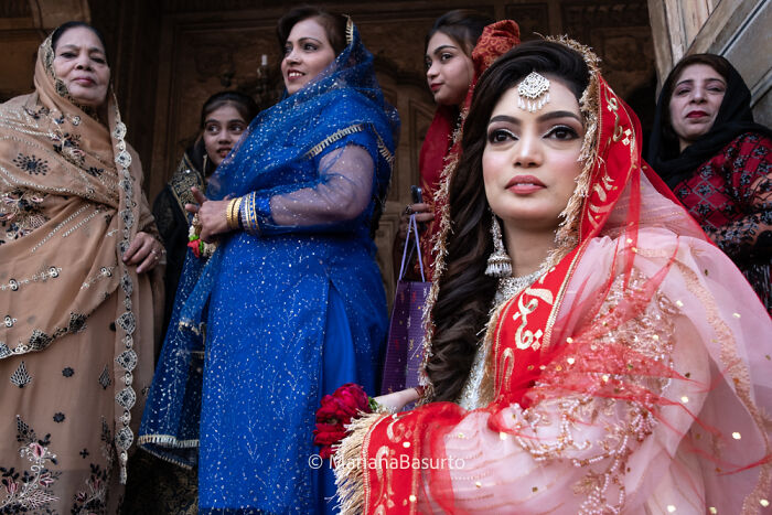 Group of women dressed in vibrant traditional attire captured by photographer revealing unseen realities of our world.