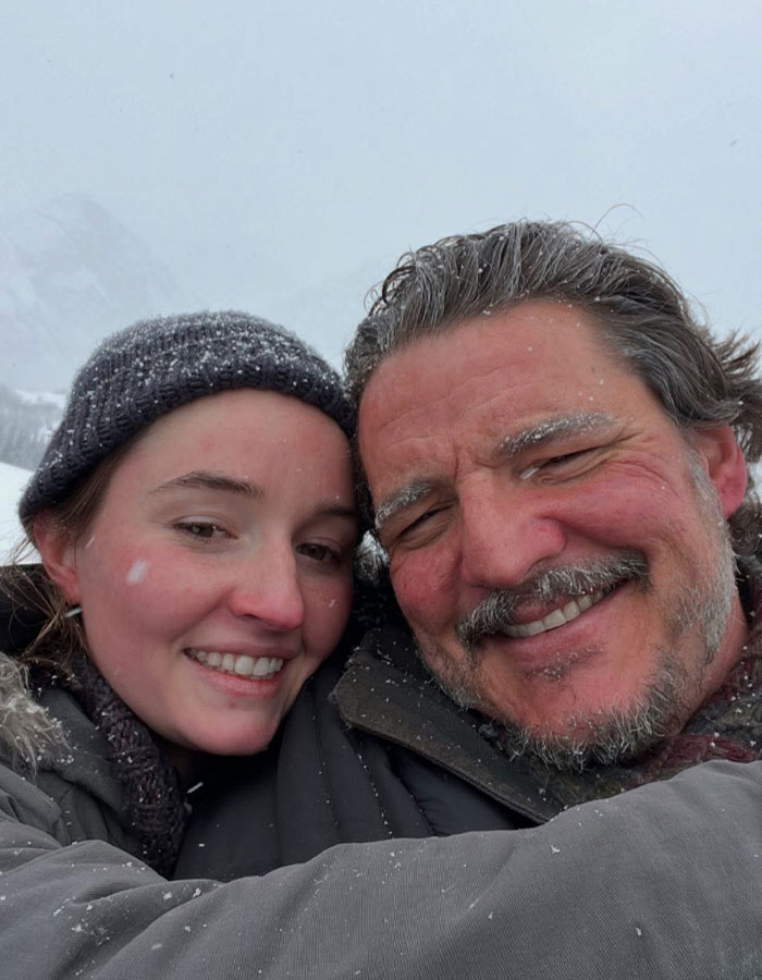 Pedro Pascal and a woman smiling outdoors in snowy weather, related to Death Eater and J.K. Rowling discussion. Pedro Pascal and a woman smiling outdoors in snowy weather, related to Death Eater and J.K. Rowling discussion.