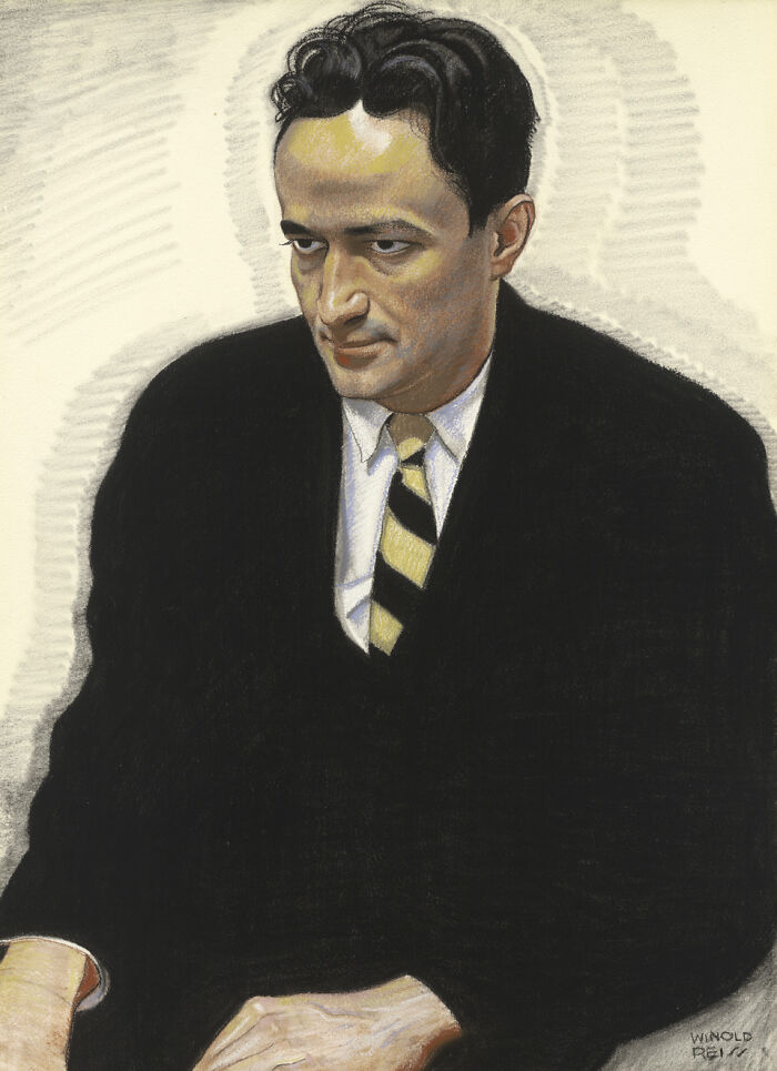 Portrait of a man in a suit and striped tie, representing key Harlem Renaissance moments in art and culture.
