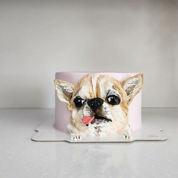3D pet-themed cake featuring a detailed dog face capturing the unique personality of the adorable pet.
