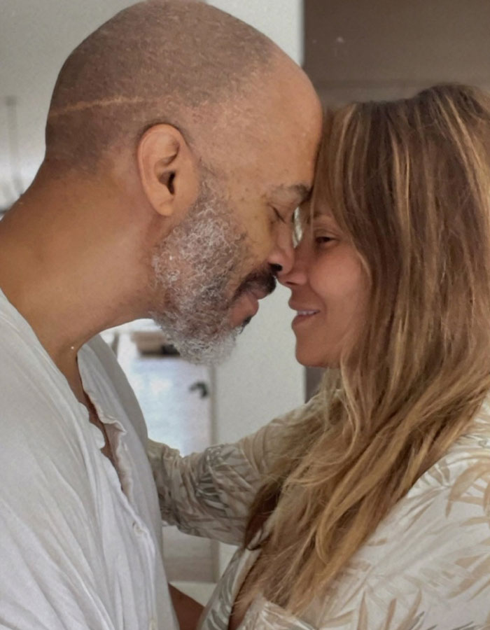 Halle Berry and her boyfriend close together in an intimate moment after five years of dating and a proposal.