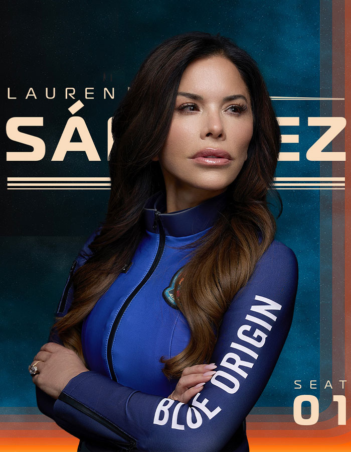 Lauren S&aacute;nchez wearing a Blue Origin suit, looking to the side, highlighting blue veins on her hands in a space-themed portrait.