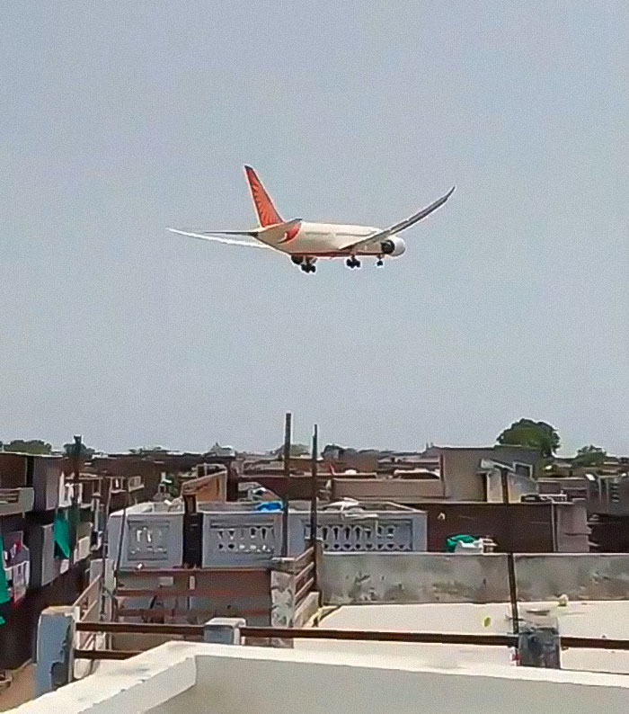 Air India Boeing jet flying low over urban area hours before tech failures and crash exposed by passenger.