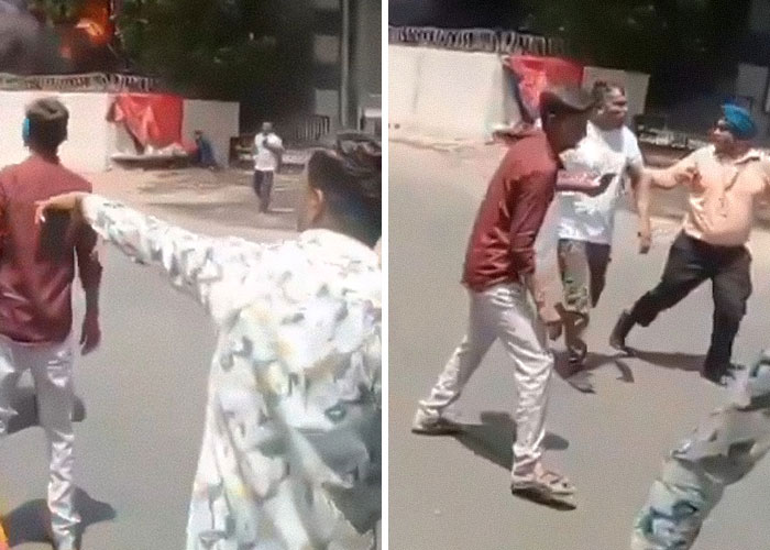 People arguing on a street, depicting controversy related to Air India crash miracle survivor and actress accusations.