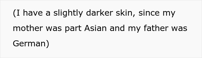 Text on a white background reading about having slightly darker skin due to mixed Asian and German heritage.
