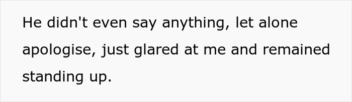 Text excerpt showing a person standing up and glaring without saying anything or apologizing.