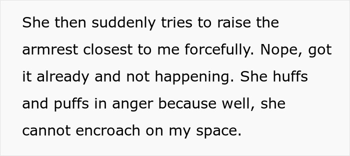 Passenger resists obese woman trying to raise armrest forcefully during flight, prompting flight attendant intervention.
