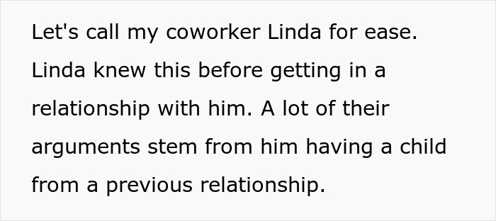 Woman giving advice to upset pregnant coworker in a bright office setting, showing support and understanding.