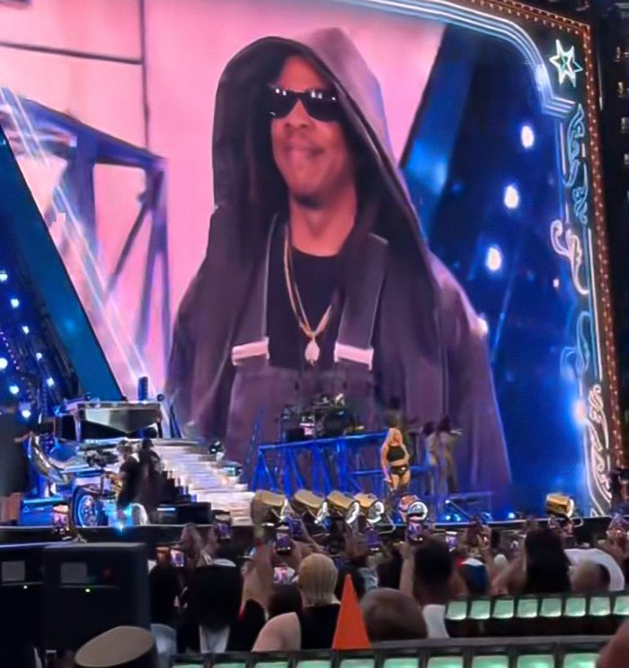 Beyonc&eacute; performing on stage during a controversial cigarette stunt amid Kanye West references in front of a large crowd.