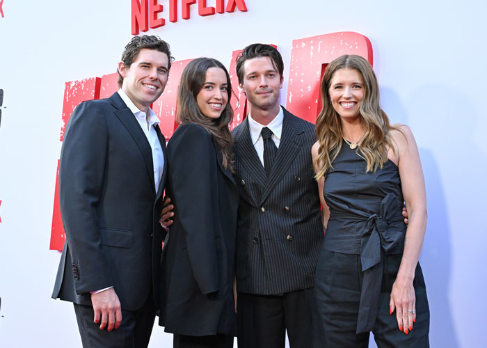 Christopher Schwarzenegger showing dramatic weight loss in a stylish black suit at a red carpet family event. Christopher Schwarzenegger showing dramatic weight loss in a stylish black suit at a red carpet family event.