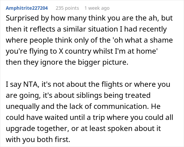 Reddit comment discussing family vacation conflict as dad upgrades one kid to business class, causing sibling tension. Reddit comment discussing family vacation conflict as dad upgrades one kid to business class, causing sibling tension.